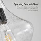 Black mini pendant light with seeded glass shade, angled close-up