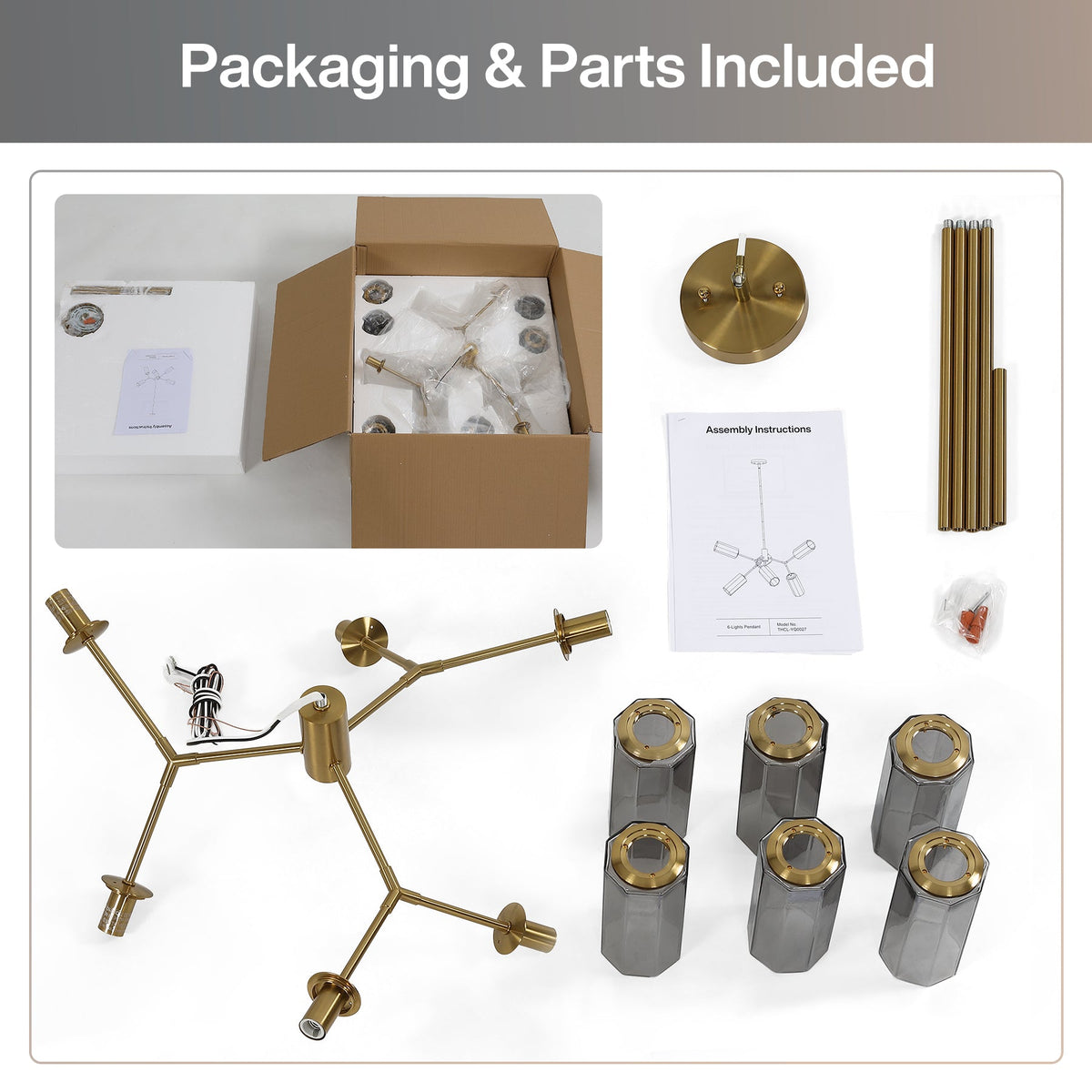 Gold branch chandelier with six smoky gray glass shades and assembly parts laid out