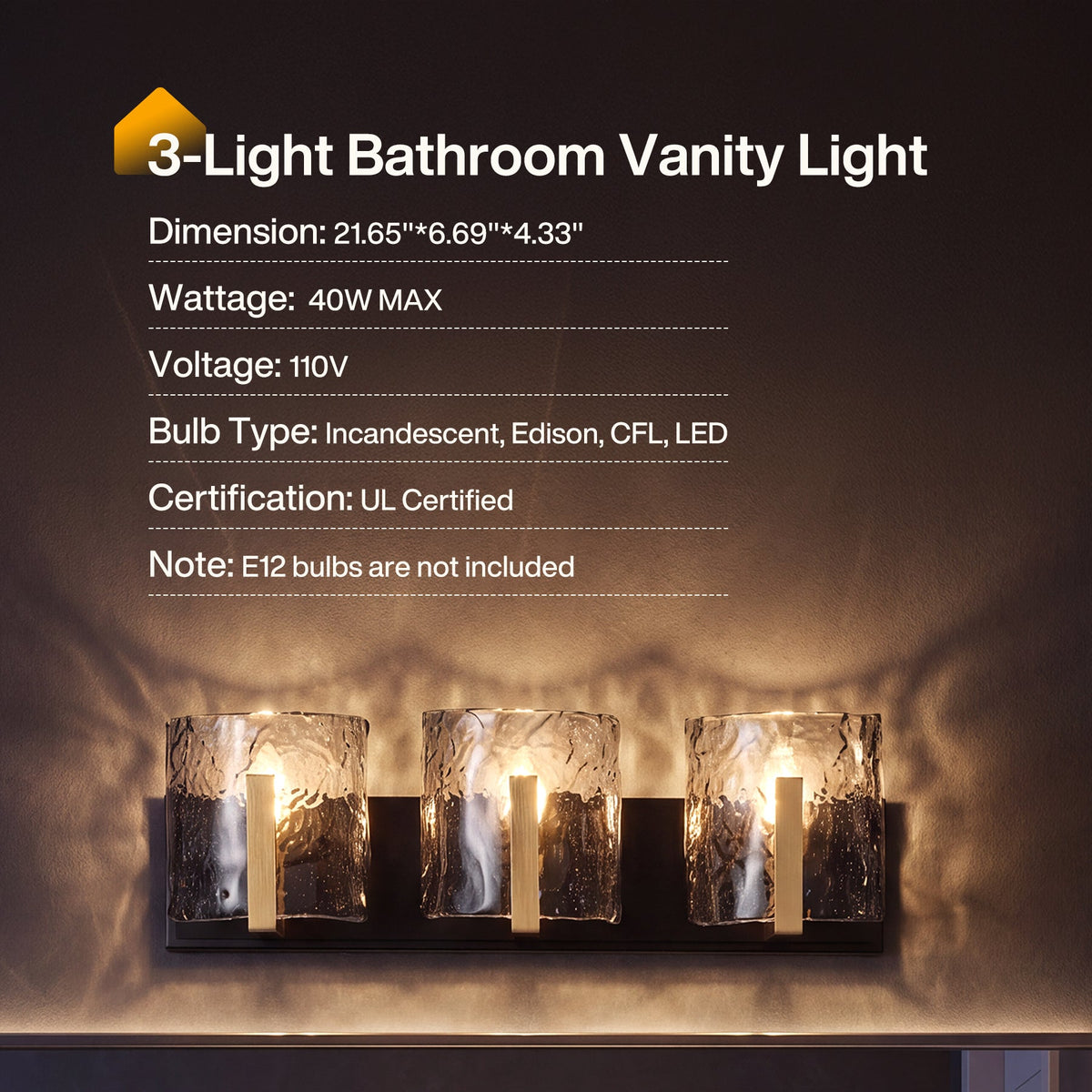 Three-light brass bathroom vanity light with smoky gray ripple glass shades, mounted on wall