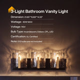 Three-light brass bathroom vanity light with smoky gray ripple glass shades, mounted on wall